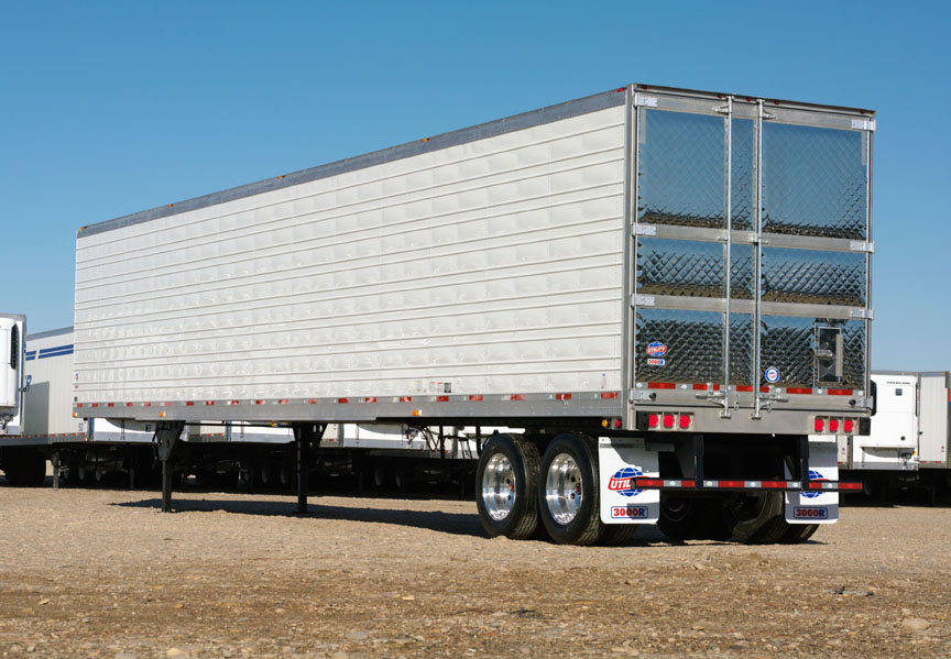 A white 2020 Utility Trailer 3000R Multi-Temp with the refrigeration unit facing us under a morning sky